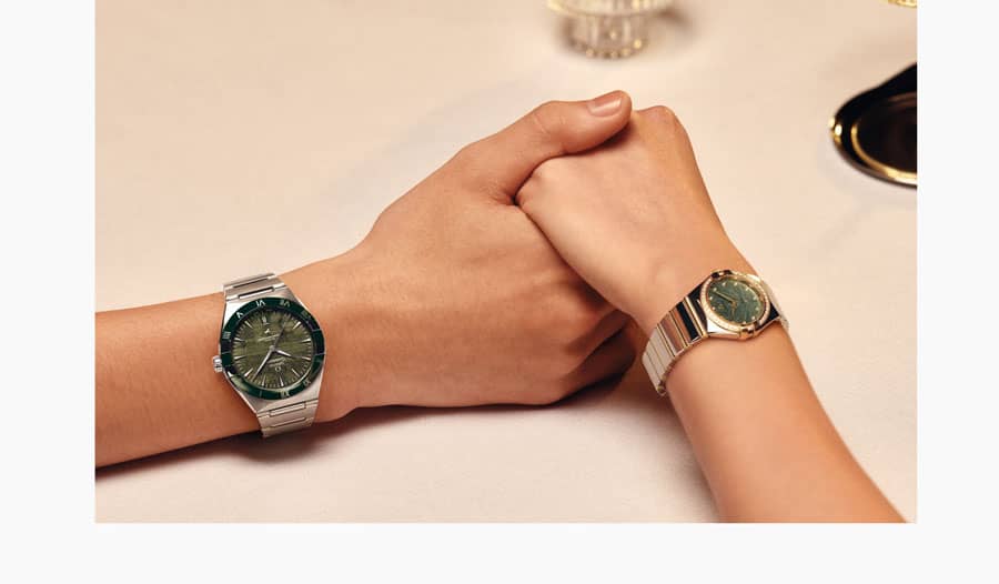 Hands wearing Constellation watches